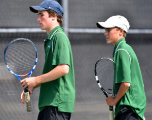 Tom’s and Laura’s sons Sam (17) and Hank (15) playing #1 doubles together on their high school tennis team