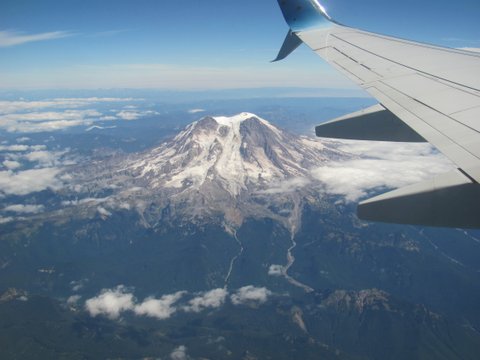 Nanci Herron Rowe flies over mountains of Washington state and waves goodbye to husband Tom. 